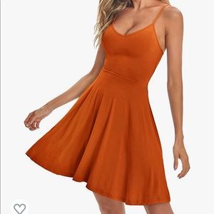 Adjustable spaghetti strap slip dress with a flattering v-neck!